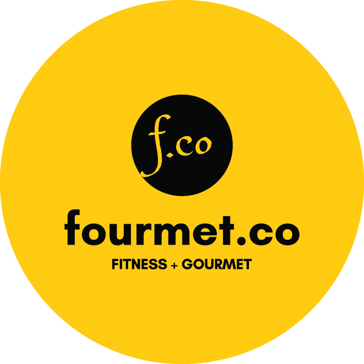 Full-sized logo of Fourmet Co. A small black circle with the letter 'f.co' in a playful script lies within a large golden circle. Beneath the black circle is the company name "fourmet.co" in small-case. The tagline "Fitness + Gourmet" appears beneath it.