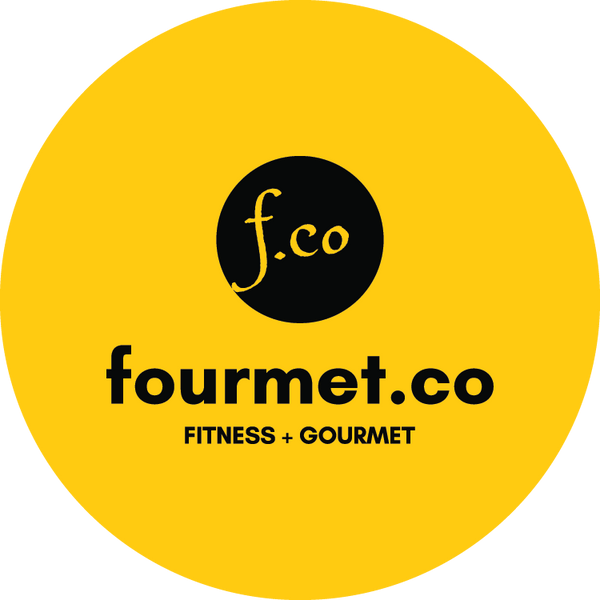 Full-sized logo of Fourmet Co. A small black circle with the letter 'f.co' in a playful script lies within a large golden circle. Beneath the black circle is the company name "fourmet.co" in small-case. The tagline "Fitness + Gourmet" appears beneath it.